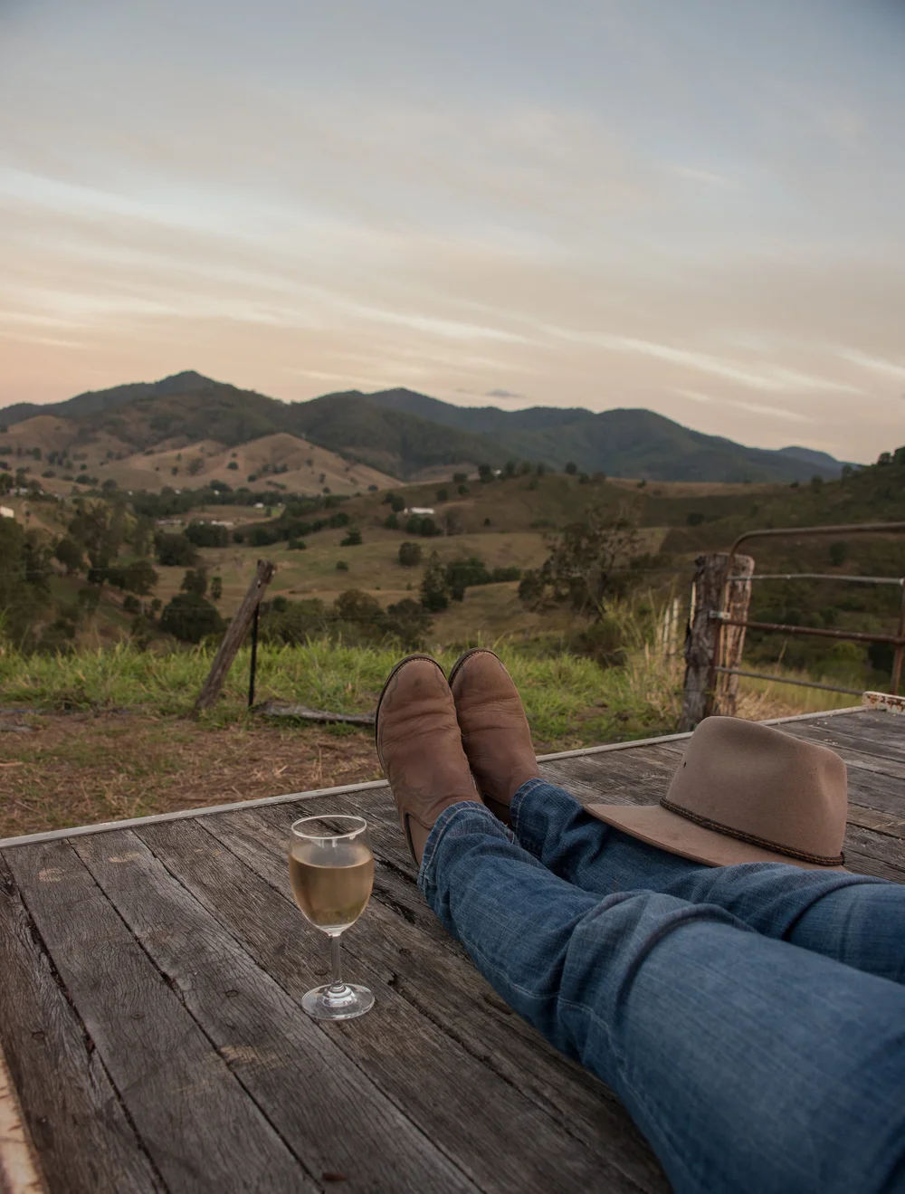 A glass of wine overlooking the Mackenzie Creek valley